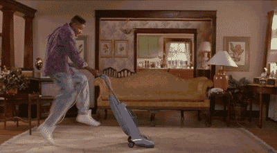 Decorative:  short video of the concept of fun in which a man is having fun vacuuming.