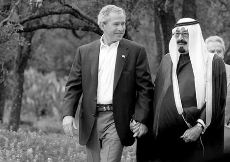Bush holding hands