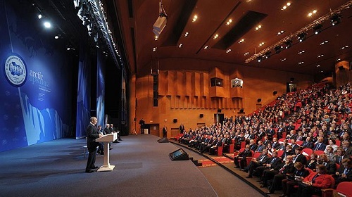 Speaker in a large hall.